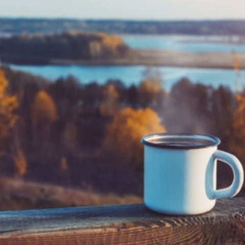 Warm cup of coffee on the outside