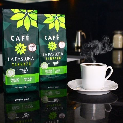 cup of hot coffee with La Pastora coffee bag in the kitchen